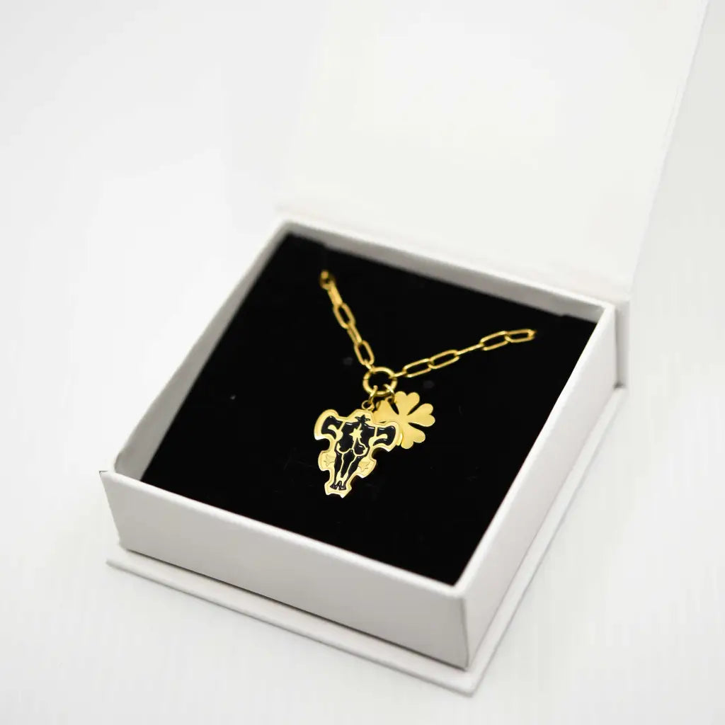 black clover black bulls necklace with 5 leaf clover in jewelry box