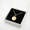 gold and silver fairy tail necklace in white packaging box